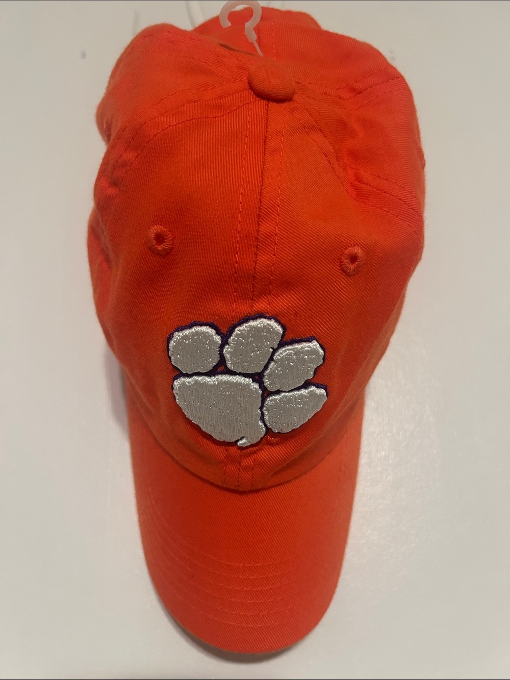 Top of the World Orange Baseball Cap with Silver Paw Patch